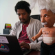 Getnet Assefa works at iCog Labs with a ‘Robo-Einstein’ at his side.